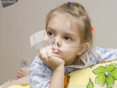 Image of four year old girl enthusiastically look left