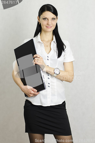 Image of Business girl with a laptop