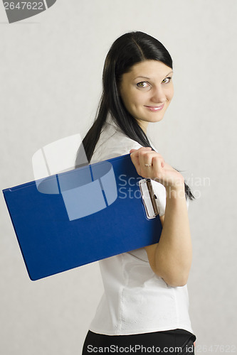 Image of Business girl keeps folder with documents