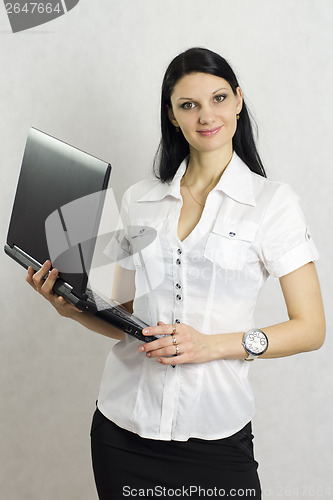 Image of Business girl with a laptop