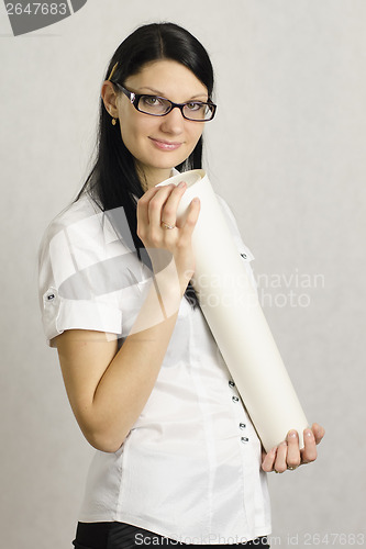 Image of The girl with a roll of paper