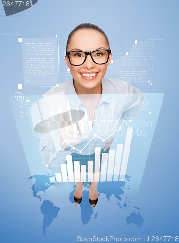 Image of smiling businesswoman with finger up