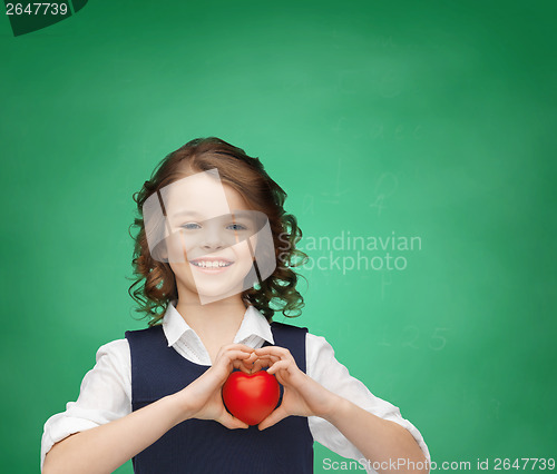 Image of girl with small heart