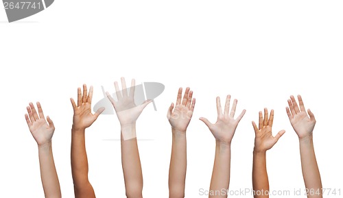 Image of human hands waving hands