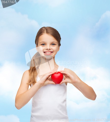 Image of girl in blank white shirt with small red heart
