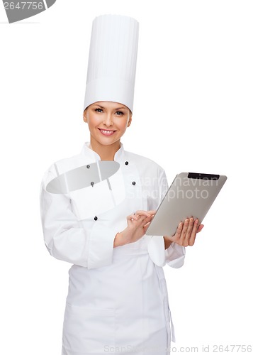 Image of smiling female chef with tablet pc computer