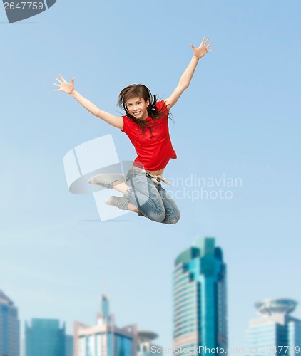 Image of smiling girl jumping
