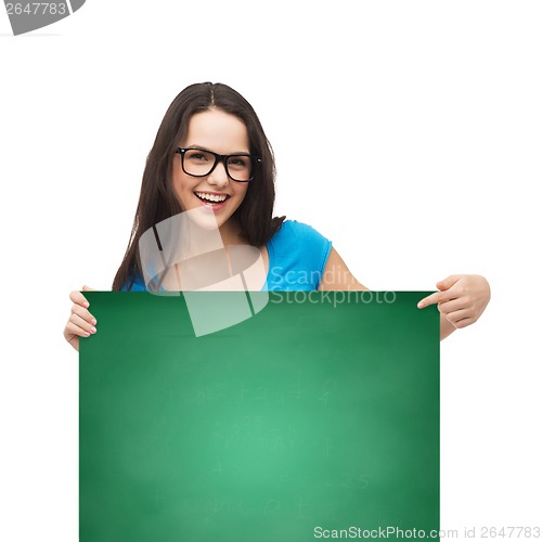 Image of smiling girl with eyeglasses and white blank board