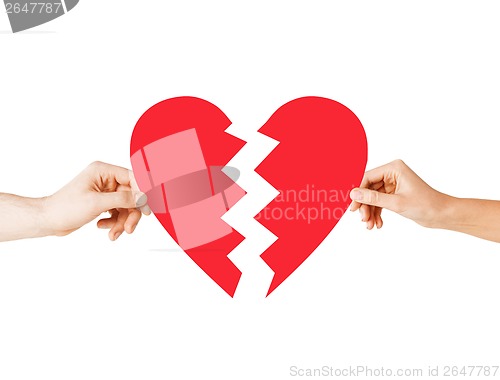 Image of hands holding broken heart