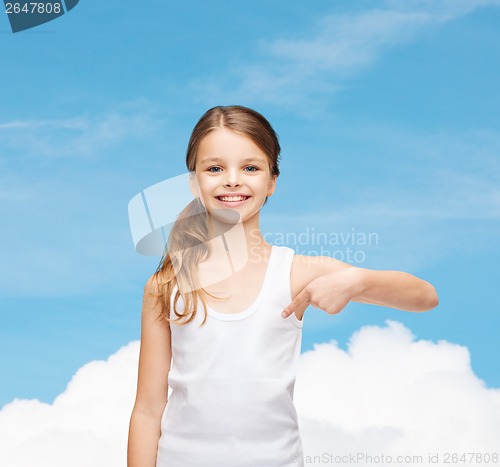 Image of smiling teenage girl in blank white shirt