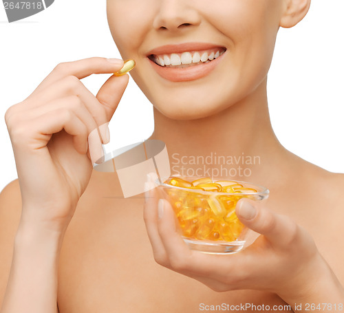 Image of beautiful woman with omega 3 vitamins
