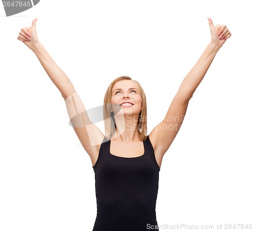 Image of woman in blank black tank top showing thumbs up