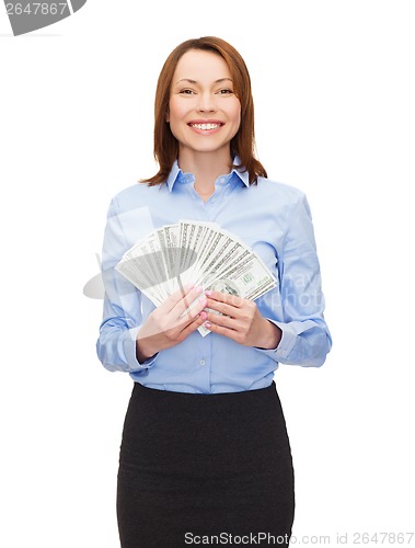 Image of young businesswoman with dollar cash money