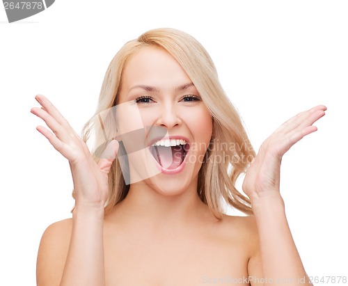 Image of face and hands of happy woman with long hair