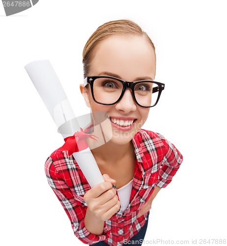 Image of smiling woman in black eyeglasses with diploma