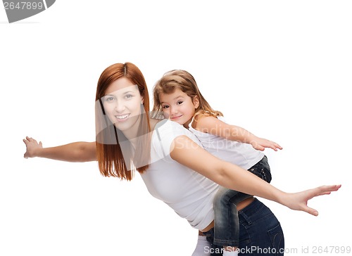 Image of happy mother and child doing piggy back