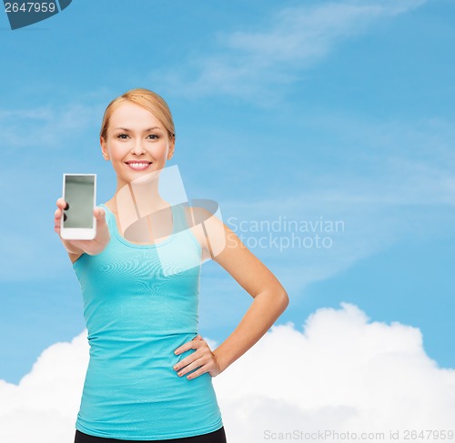 Image of sporty woman with smartphone