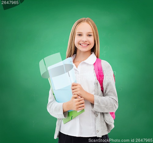 Image of happy and smiling teenage girl