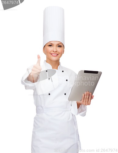 Image of smiling female chef with tablet pc computer