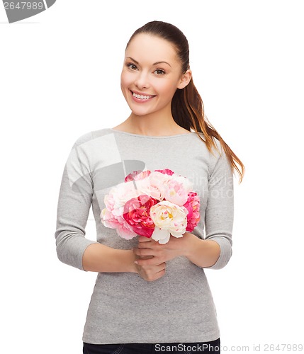 Image of young woman with bouquet of flowers
