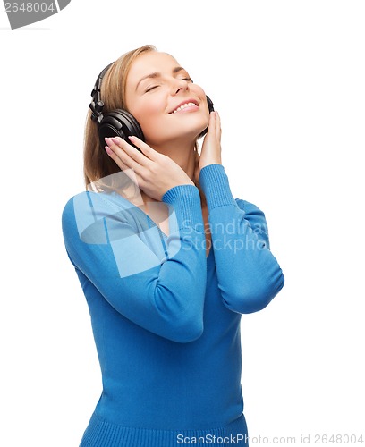 Image of smiling young woman with headphones