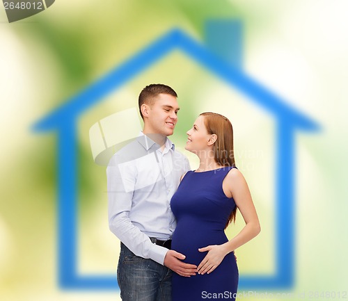 Image of happy young family expecting child