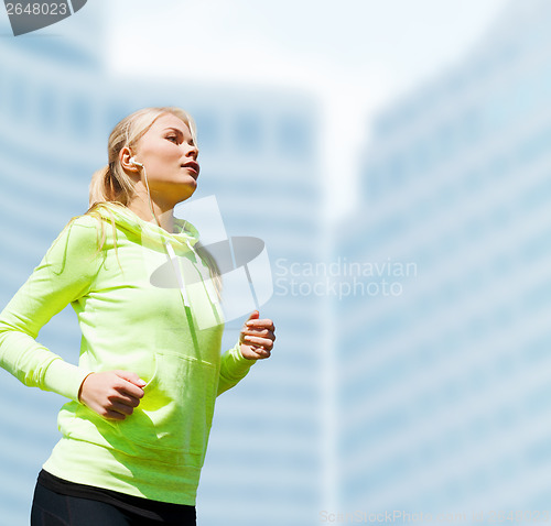 Image of woman doing running outdoors