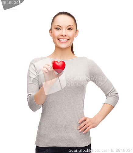 Image of smiling asian woman with red heart