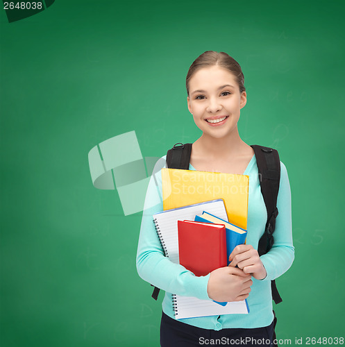 Image of happy and smiling teenage girl