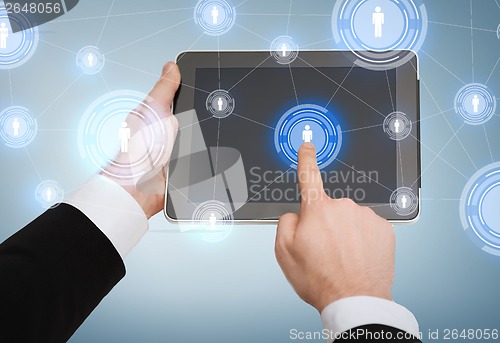 Image of close up of man hands touching tablet pc