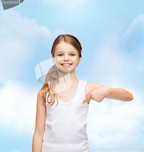 Image of smiling teenage girl in blank white shirt