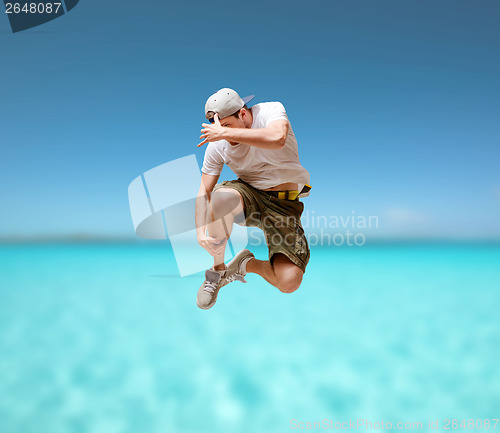 Image of male dancer jumping in the air