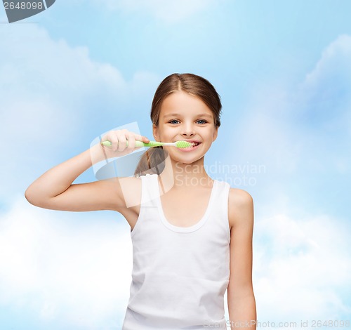 Image of girl in blank white shirt brushing her teeth