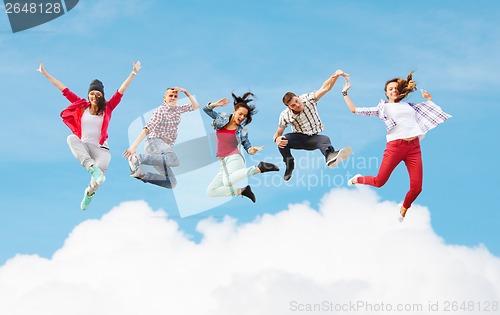 Image of group of teenagers jumping