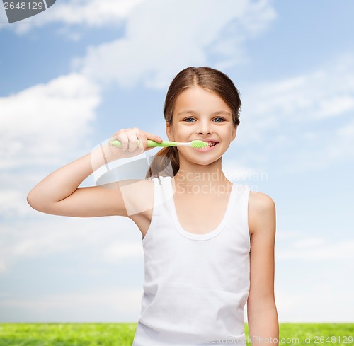 Image of girl in blank white shirt brushing her teeth