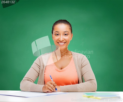 Image of international student studying in college