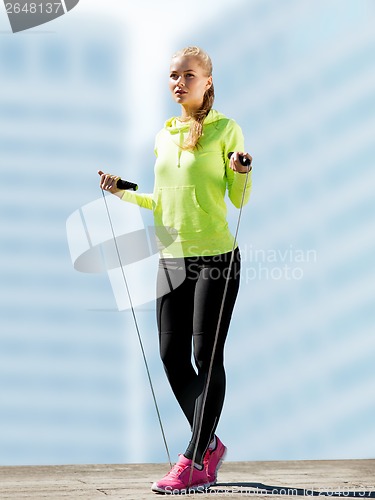 Image of woman doing sports outdoors