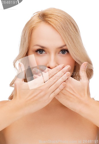 Image of beautiful woman covering her mouth