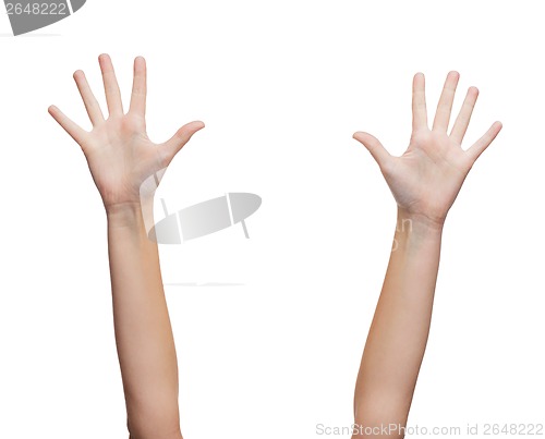 Image of two woman hands waving hands