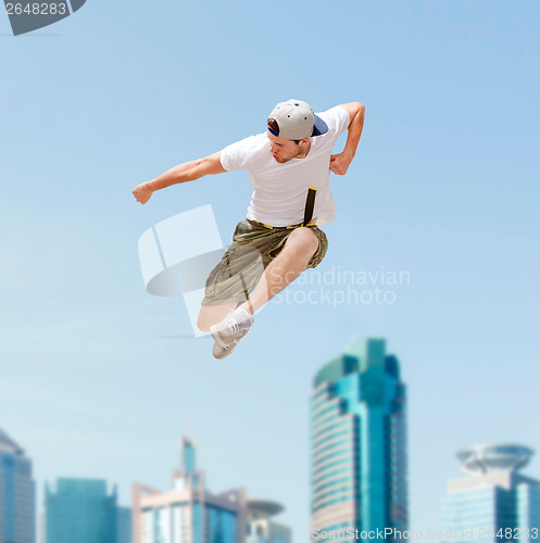 Image of male dancer jumping in the air