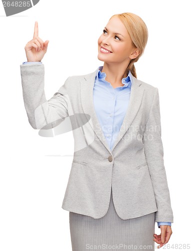 Image of smiling businesswoman with her finger up