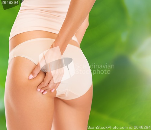 Image of woman in cotton underwear showing slimming concept