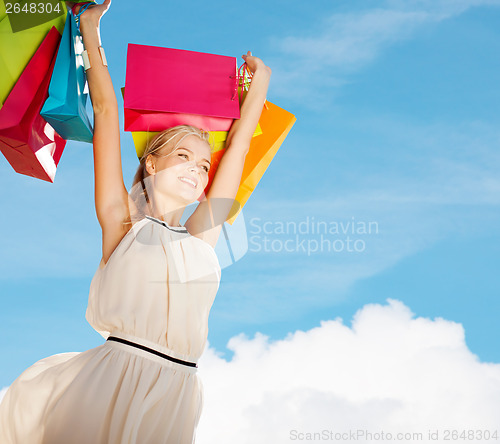 Image of woman with shopping bags