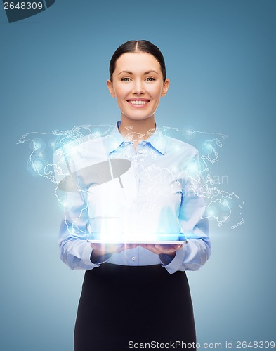 Image of businesswoman with tablet pc and world hologram