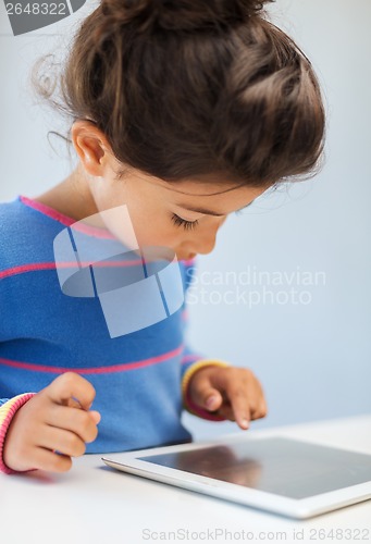 Image of little girl with tablet pc