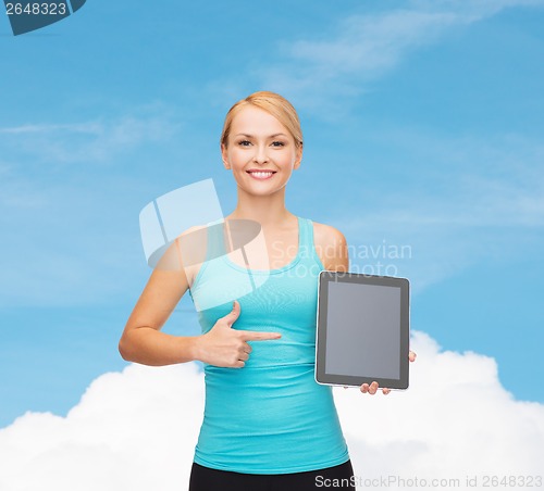 Image of sporty woman with tablet pc blank screen