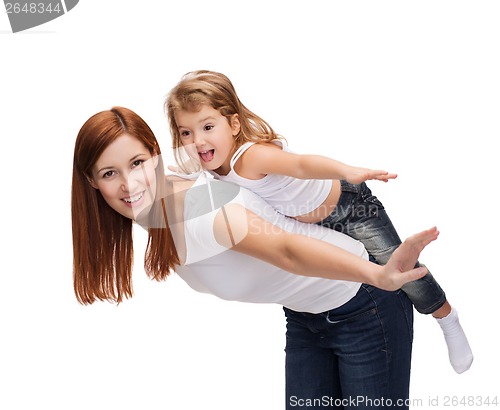 Image of happy mother and child doing piggy back