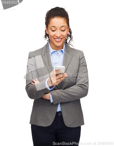 Image of smiling woman looking at smartphone