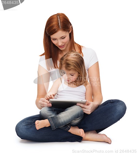 Image of happy mother with little girl and tablet pc