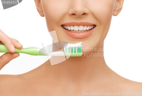 Image of woman with toothbrush